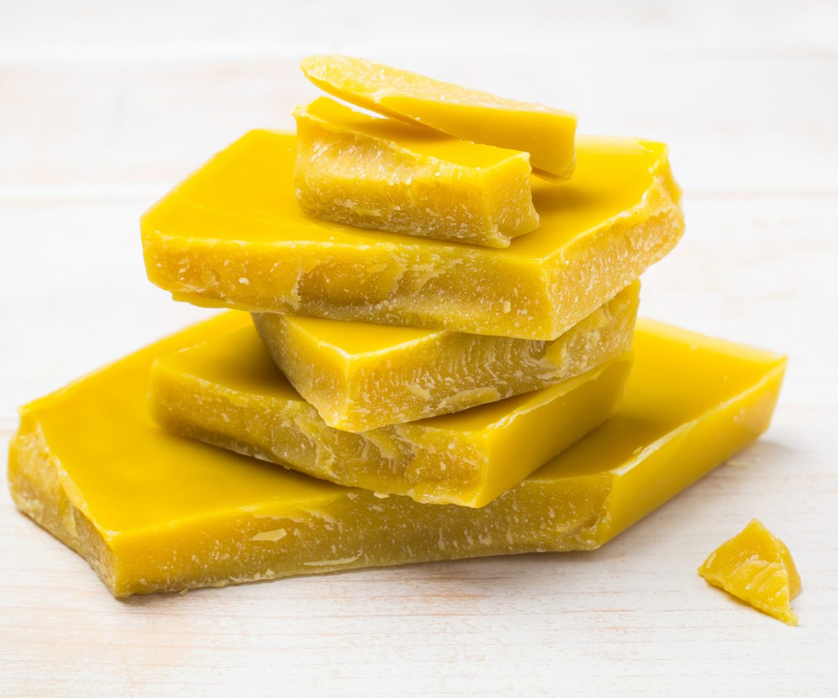 The pieces of natural pure organic yellow beeswax for natural beauty and DIY project.